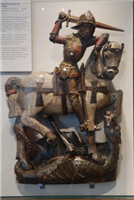 This painted wooden figure of St George and the Dragon was formerly in St George's Chapel on the city walls at Gosford Street Gate. It is a rare survival of an English image of a saint carved in wood.